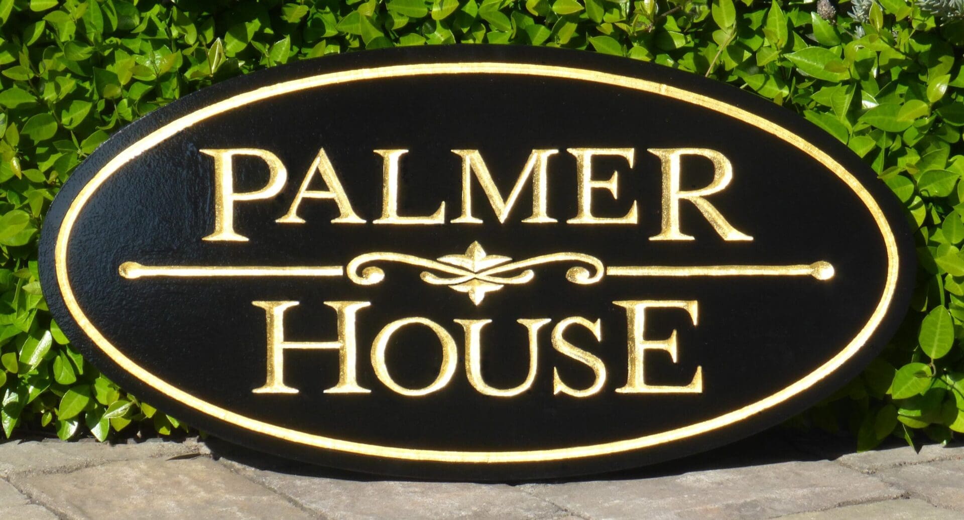 Palmer House sign with decorative border.