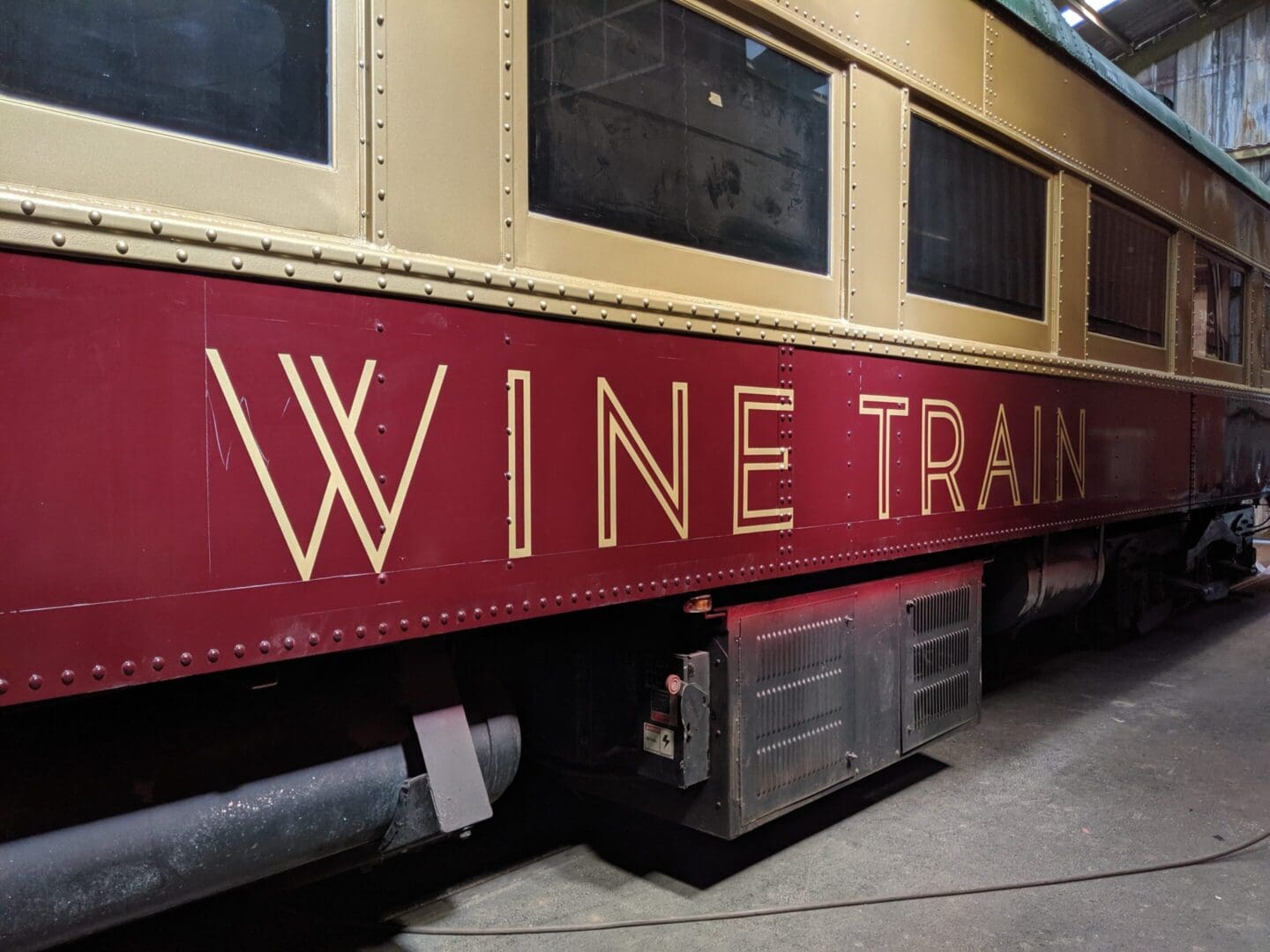 Vintage train with "Wine Train" signage.