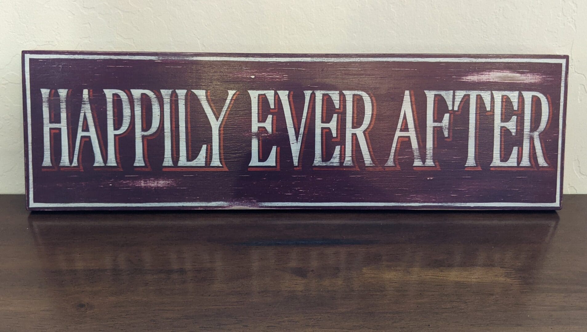 Sign reading "Happily Ever After".